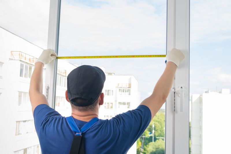 Skilled Window Installers at Work